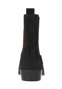Bottines en suède marron foncé avec une texture lisse, dotées d'un talon en bois empilé et de panneaux élastiques latéraux pour un enfilage facile.