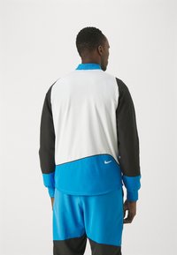 Nike Performance Trainingsjacke - light photo blue/black/white