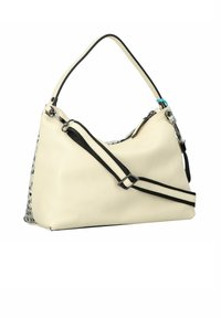 Witte leren handtas met een gestructureerde afwerking, zwarte accenten en een verwijderbare strap. Bevat een ritsvak en een achterkant met een meerkleurig patroon.