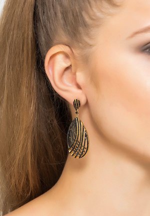 Black and gold teardrop earrings with a textured design, featuring vertical black lines and crystal accents for added detail.