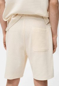 Mango XAVIS - Teplákové kalhoty - off-white