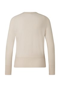 Beige sweater with long sleeves, crew neck, and ribbed cuffs and hem. Smooth texture with a fitted silhouette and no visible patterns.