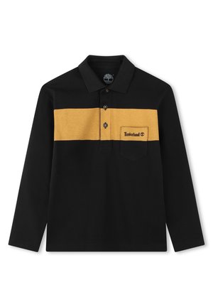 Camiseta polo negra de manga larga con una ancha franja horizontal color mostaza y un bolsillo en el pecho con el logo de Timberland en el lado derecho.