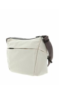 Sac porté croisé en tissu beige clair avec une texture lisse, comprenant un compartiment principal zippé et une poche avant zippée, bandoulière ajustable marron.