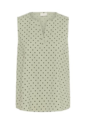 Bluză fără mâneci de culoare verde deschis, cu decolteu în formă de V, având buline negre și o croială lejeră. Material moale, texturat, cu o siluetă liberă.