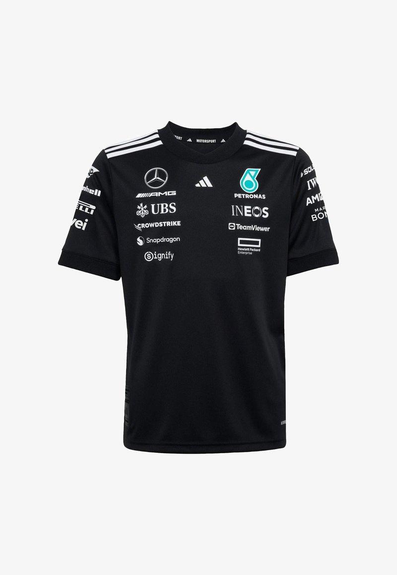 Schwarzes Sporttrikot mit Rundhalsausschnitt, kurzen Ärmeln und weißen Akzenten. Mehrere Sponsorlogos sind auf der Vorderseite deutlich sichtbar.
