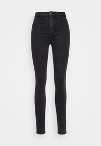 Jeans ajustados de talle alto en negro con diseño de cinco bolsillos, fabricados en tela de mezclilla y con cierre de botón en la parte frontal. Textura suave, sin patrones visibles.
