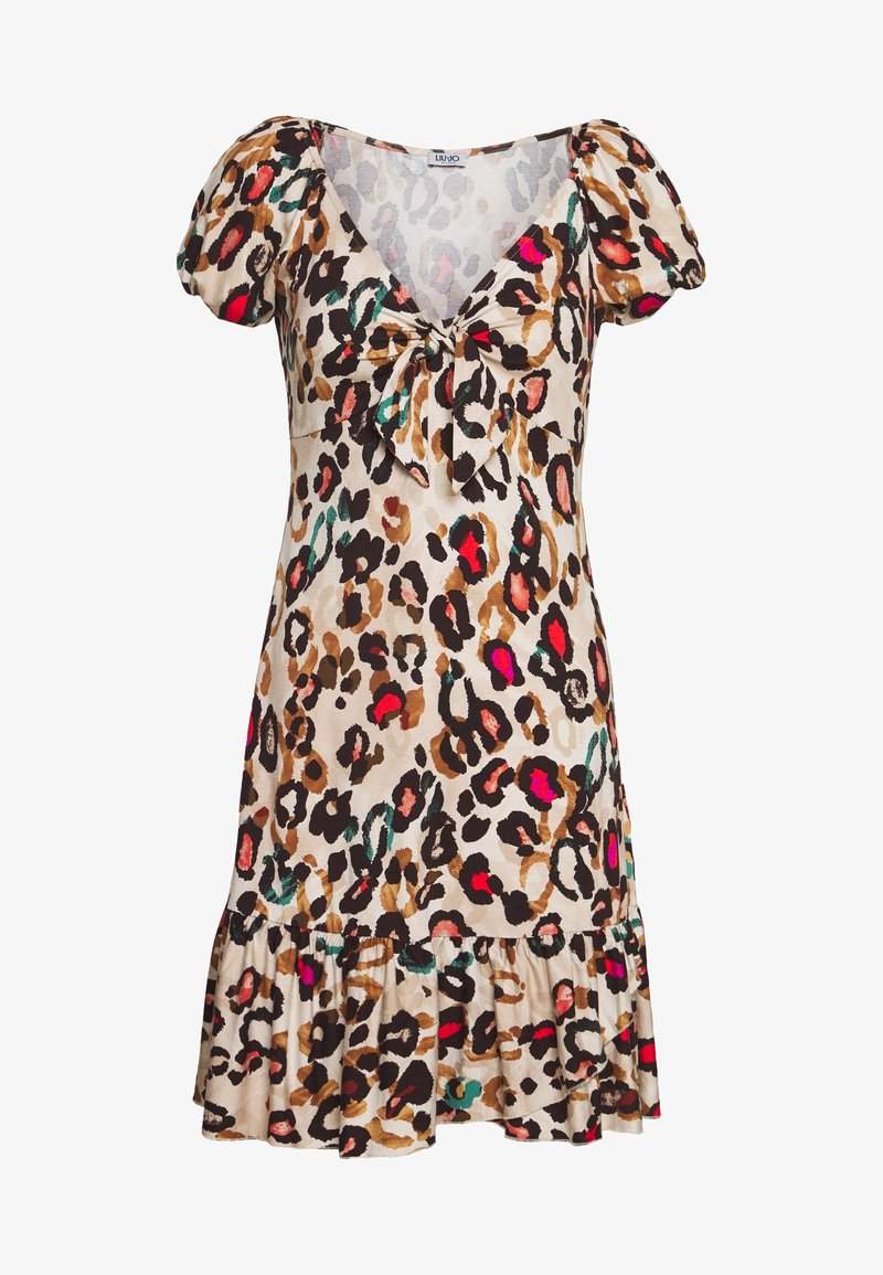 Robe courte à imprimé léopard avec manches bouffantes, col en V et détail de nœud devant, avec des taches multicolores sur un tissu beige et un ourlet volanté.