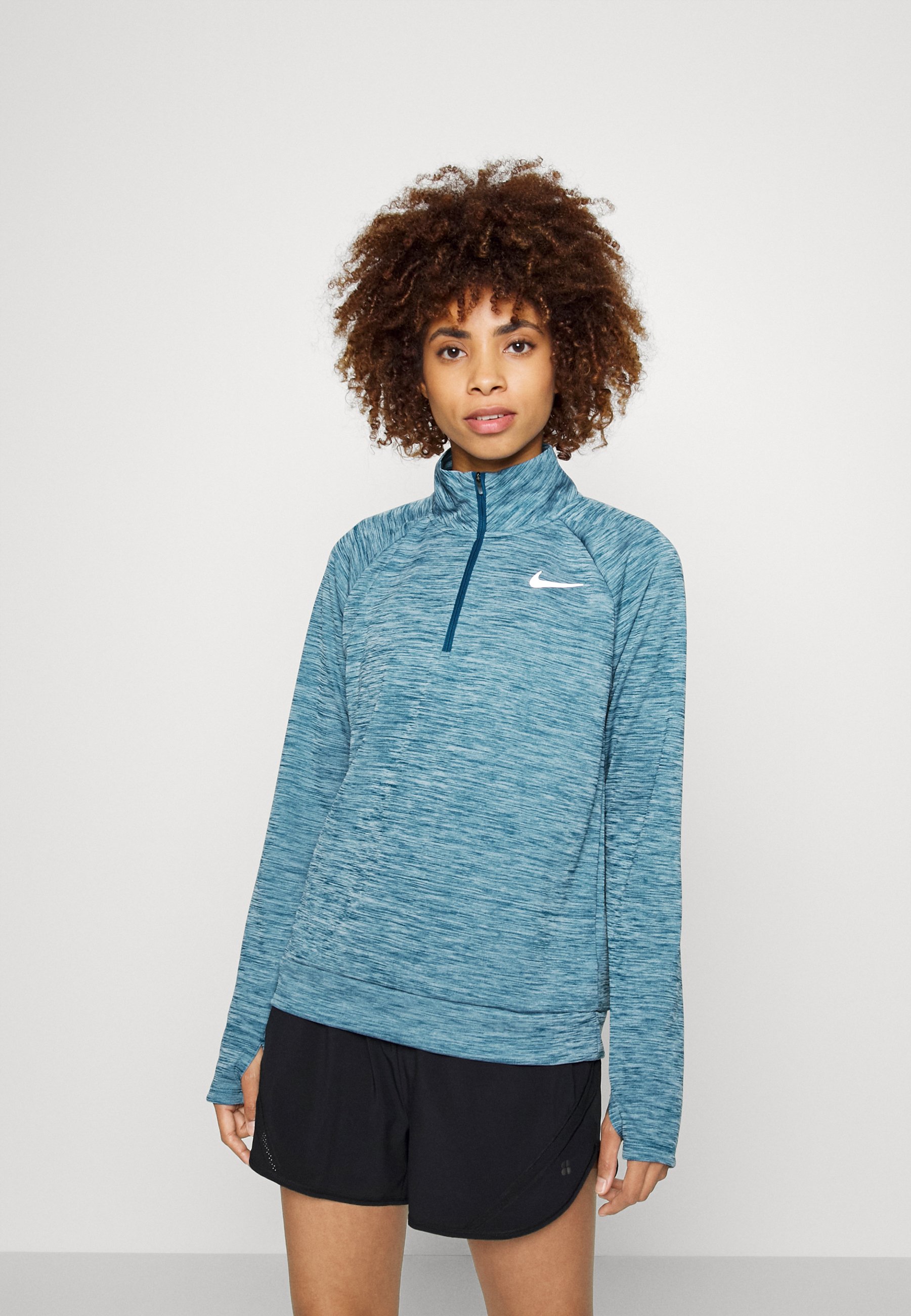 turquoise nike half zip