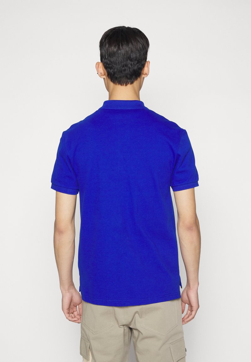 Herren T-shirts & Polos | MOSCHINO UPPER BODY GARMENT Poloshirt blue/hellblau - SZ15129 Herren T-shirts & Polos | MOSCHINO UPPER BODY GARMENT Poloshirt blue/hellblau - SZ15129