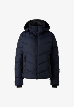 Navy blue puffer jacket with a hood, featuring quilted pattern, front zip closure, and zippered side pockets. Adjustable cuffs with thumbholes.