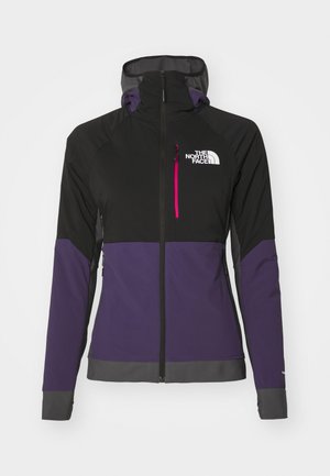 Kurtka z kapturem w kolorze czarnym i fioletowym w designie blokowym. Wykonana z lekkiego materiału, z zamkiem błyskawicznym z przodu i logo na klatce piersiowej.