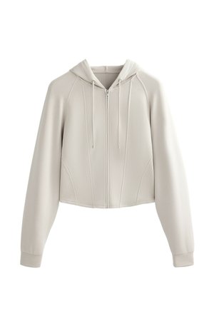 Beige Kapuzenpullover mit Reißverschluss, Kordelzügen und langen Ärmeln. Verfügt über einen strukturierten Stoff und Nahtdetails für mehr Form.
