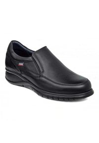 Scarpa slip-on in pelle nera con punta arrotondata, pannelli laterali elasticizzati e tacco texturizzato. Presenta una suola imbottita per il massimo comfort.