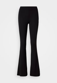 Svarta utsvängda leggings gjorda av stretchigt tyg, med en jämn yta och ett hög midja, designade för komfort och flexibilitet.