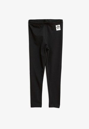 Leggings neri realizzati in tessuto elasticizzato, con una cintura elastica e una piccola etichetta con logo di panda bianco sul lato. Texture liscia.