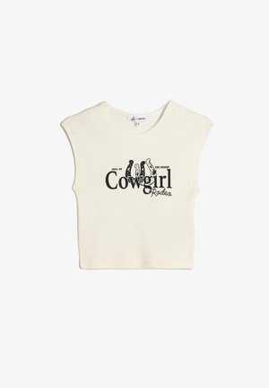 Crèmekleurig cropped t-shirt met korte mouwen. Voorzien van een zwarte grafische print met de tekst "Soul of the Desert Cowgirl Rodeo." Zachte textuur.