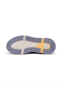 Shoe sole featuring a textured design with hexagonal patterns in gray and yellow accents, with grooves for traction and stability.