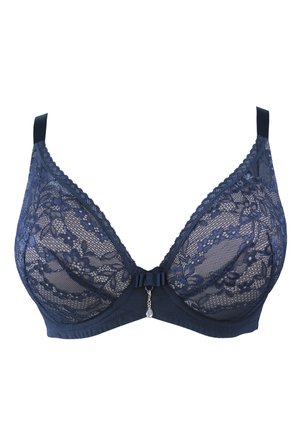 Navyblaue Spitzen-BH mit Blumenmustern, transparenter Stoff, Unterstützung durch Bügel, verstellbare Träger und eine dekorative Schleife mit einem Anhänger in der Mitte.
