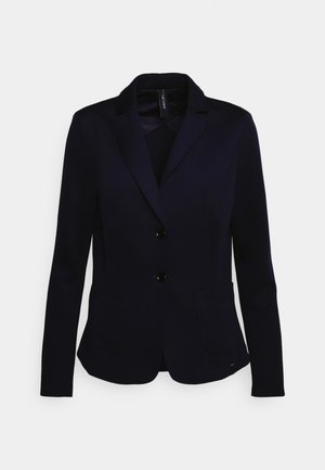 Navy blazer made of structured fabric, featuring a notched collar, two front pockets, and two buttons. Slim fit design with a smooth texture.