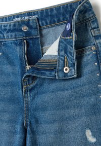OVS CULOTTE WITH STUDS AND ABRASIONS - Vaqueros a campana - medium wash