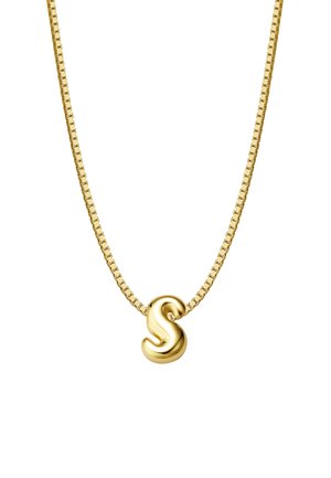 Zelta ķēdes kaklarota ar viļņainu burta "S" piekari. Dizains ir elegants, ar gludu tekstūru un atstarojošu virsmu.