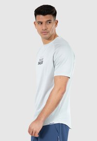 Smilodox POWERFIT TRIPLE PERFORMANCE - Camiseta deportiva - grau