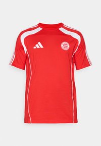 Red short-sleeve jersey made from lightweight fabric, featuring white accents, crew neck, and FC Bayern München logo on the front.