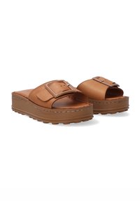 Brown leather platform sandals with a wide strap and square buckle detail. Slightly textured midsole and flat rubber outsole.
