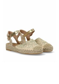 Sandalias de esparto beige con correas doradas, textura tejida y bordado floral verde en la parte frontal. Cuentan con una suela de cuerda de yute.