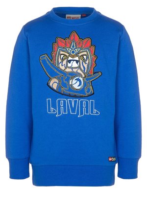 Blauer Pullover mit einem wilden Cartoon-Löwen, der rote und blaue Rüstung trägt, einen Schild hält und unter dem Motiv "LAVAL" steht.