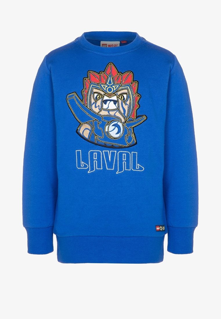 Blauer Pullover mit einem wilden Cartoon-Löwen, der rote und blaue Rüstung trägt, einen Schild hält und unter dem Motiv "LAVAL" steht.
