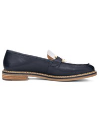 Navy blue and white leather loafer with tan stitched sole and gold metal detail on upper slip-on design.