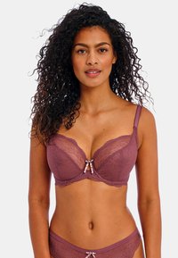 Plunge bra in mauve lace with sheer upper cups and decorative bow at center. Adjustable straps and scalloped edges are notable features.