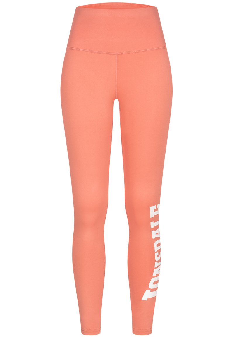 Persikofärgade leggings med hög midja, tillverkade av elastiskt material. Har vit text längs vänster ben. Slät struktur överallt.