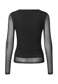 Μαύρη μπλούζα με μακριά μανίκια και διάφανη πλέξη, με λευκές τελείες διάσπαρτες σε όλη την επιφάνεια και εφαρμοστή σιλουέτα.