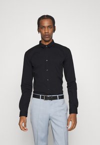 HUGO Vapaa-ajan kauluspaita - black