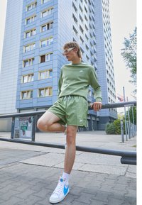 Nike Sportswear M NSW SPE WVN LND FLOW SHORT - Calças de fato de treino - alligator