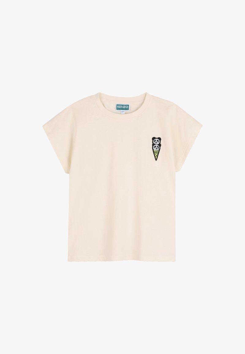 T-shirt beige à manches courtes avec un petit patch brodé représentant une glace en forme de panda sur la poitrine gauche et un col rond.