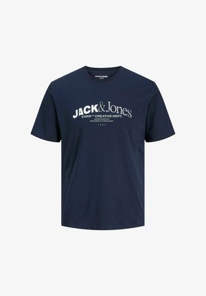 T-paita lyhyillä hihoilla, tummansinisestä puuvillasta. Sisältää valkoisen graafisen tekstin: "JACK & Jones CORE™ CREATIVE DEPT." sekä muita suunnitteluyksityiskohtia.
