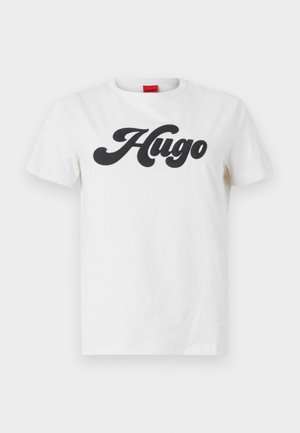 White cotton t-shirt with short sleeves featuring a large black "Hugo" logo printed on the front. Classic crew neck design.
