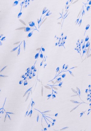 Tissu blanc avec un motif floral bleu, agrémenté de nuances de gris clair. Le design comprend de petites branches et des fleurs épanouies.