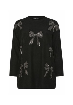 Czarny top z długim rękawem, ozdobiony wieloma srebrnymi kokardkami z cekinów. Prosty okrągły dekolt, luźny krój i miękka tekstura materiału.