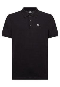 Polo shirt nera in cotone, dotata di colletto classico, placca con tre bottoni, maniche corte e un piccolo logo bianco sul petto.