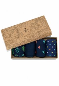 Štiri para mornarsko modrih nogavic v kraft škatli. Vzorce sestavljajo zeleni listi, pisan ptice in pikice na temnem ozadju.