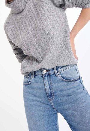 Trui - mottled light grey