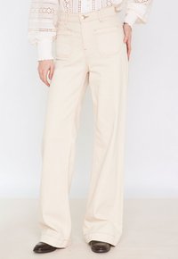 Flared Jeans - creme