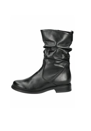 Black leather ankle boot featuring a slouched design, rounded toe, and low heel with stitched accents along the sides.