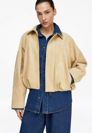 - Kurtka ze skóry ekologicznej