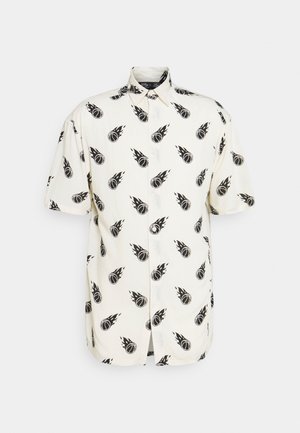 Short-sleeve white button-up shirt with black flaming basketball pattern, pointed collar, and relaxed fit.